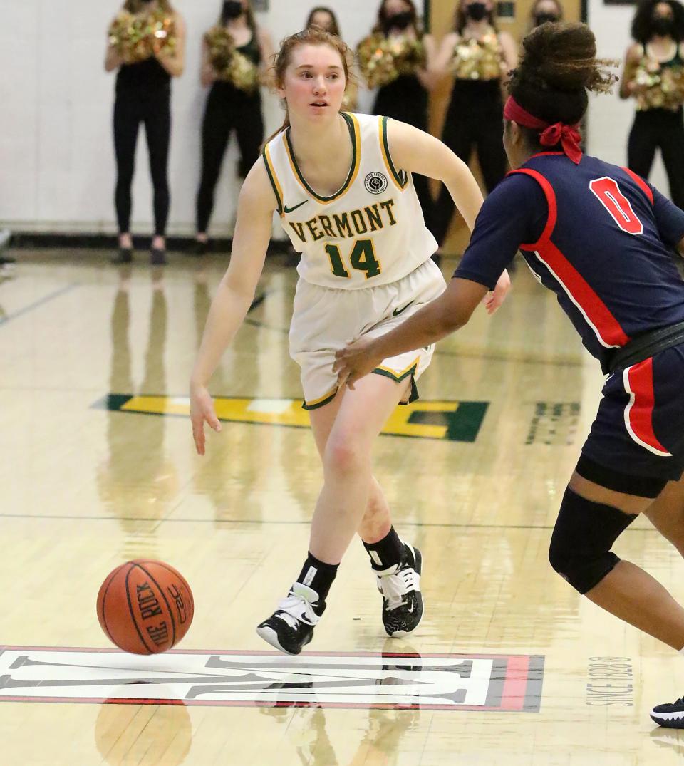 Vermont's Catherine Gilwee surveys the Seawolves defense during the Catamounts 71-63 loss to Stony Brook on Wednesday night at UVM's Patrick Gym.