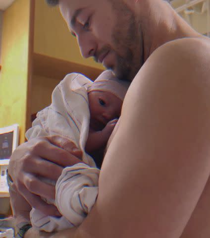 <p>ashley wagner/instagram</p> Alex Clark with his baby girl Rosalie Starbird