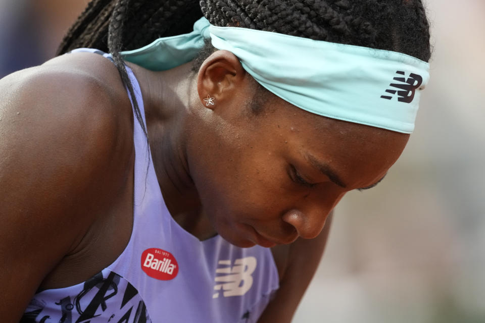 Coco Gauff of the U.S reacts as she plays Poland's Iga Swiatek during their final match of the French Open tennis tournament at the Roland Garros stadium Saturday, June 4, 2022 in Paris. (AP Photo/Christophe Ena)