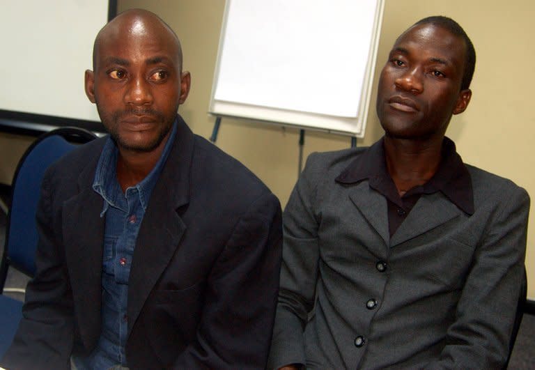 Tiwonge Chimbalanga (R) and his gay husband Steven Monjeza prior to a press conference on June 2, 2010, five days after Malawi President Bingu wa Mutharika pardoned them. Thrown into jail for 14 years under Malawi's anti-gay laws, Chimbalanga has no regrets about the marriage ceremony that became a symbol of Africa's intolerance toward homosexuality