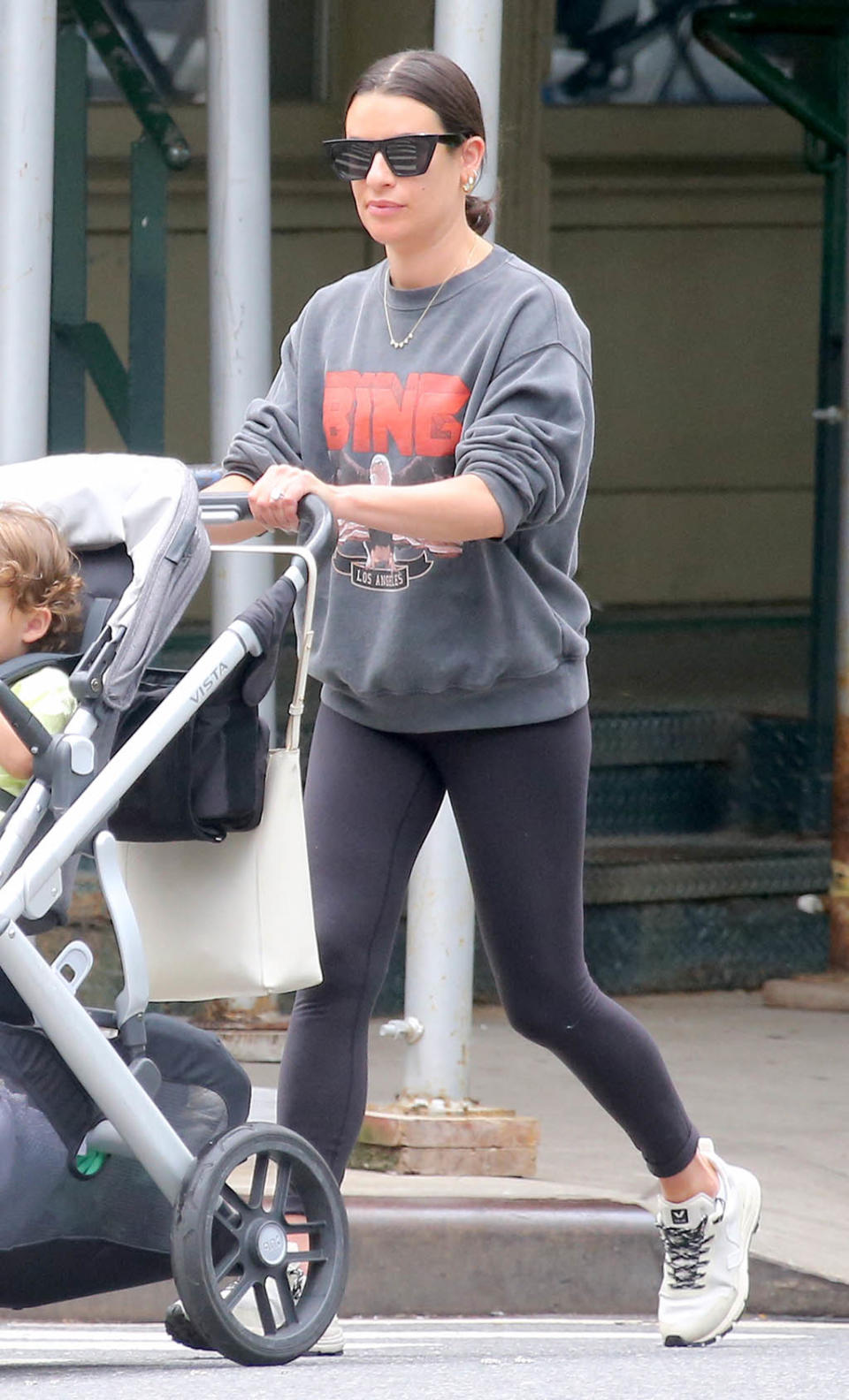 Lea Michele takes a stroll with her son in Tribeca, New York City on June 23, 2022. - Credit: AbacaPress / SplashNews.com