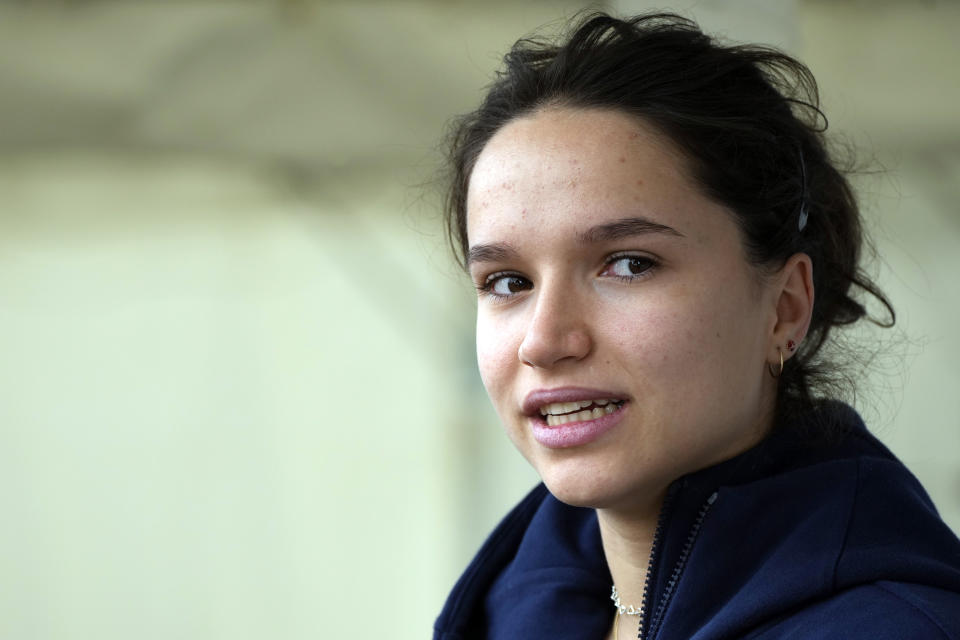 Oriane Bertone of France speaks after participating in the women's lead semi-final of the IFSC Climbing World Cup, Friday, Oct. 21, 2022, in Morioka, Iwate Prefecture, Japan. After Iranian climber Elnaz Rekabi joined a growing list of female athletes who have been targeted by their governments for defying authoritarian policies or acting out against bullying, a number of athletes have spoken out on their concerns of politics crossing into their sporting world. (AP Photo/Eugene Hoshiko)