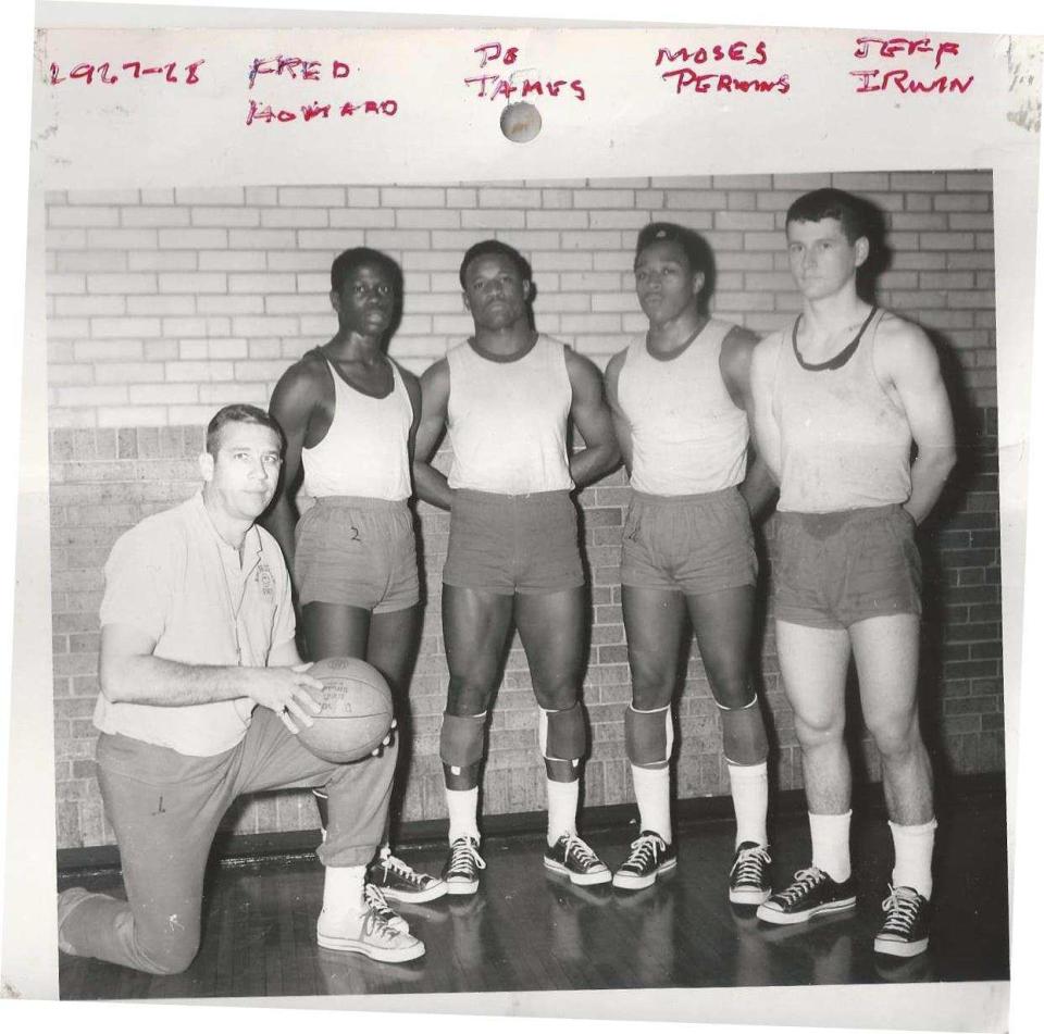 Bill Edwards kneeling kneeling with some of his 1967 New Brighton basketball players.