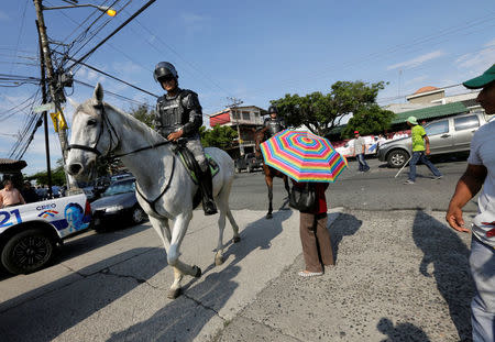 Mounted police officers arrive near the electoral council in Guayaquil, Ecuador February 20, 2017. REUTERS/Henry Romero