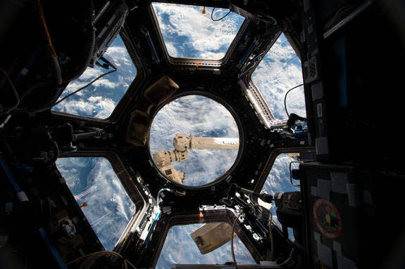 This image was taken by NASA astronaut Scott Kelly, looking out through the 360 degree viewport on the International Space Station.