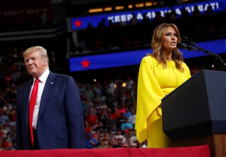 First lady Melania Trump speaks as U.S. President Donald Trump looks on as he formally kick off his re-election bid with a campaign rally in Orlando