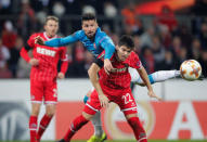 Soccer Football - Europa League - FC Cologne vs Arsenal - RheinEnergieStadion, Cologne, Germany - November 23, 2017 Arsenal's Olivier Giroud in action with Cologne's Jorge Mere REUTERS/Wolfgang Rattay