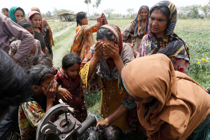 The Wider Image: In hottest city on Earth, mothers bear brunt of climate change