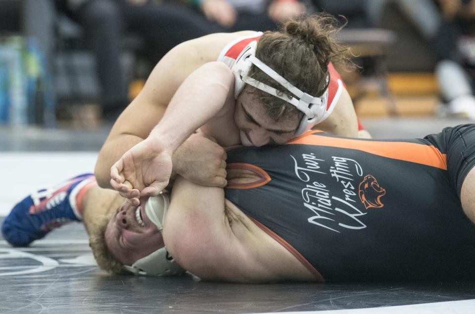 Delsea's Danny DiGiovacchino, top, controls Middle Twp.'s David Giulian during the 190-pound final of the Region 8 wrestling championships at Egg Harbor Township High School, Saturday, Feb. 26, 2022.  DiGiovacchino pinned Giulian to win the bout.