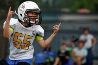 <p>An Eagles player celebrates during a training session of the Future League American football youth league team in Beijing, May 28, 2017. (Photo: Thomas Peter/Reuters) </p>