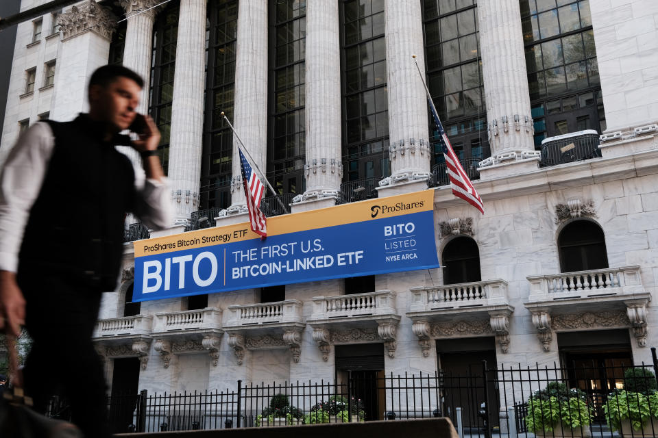 A banner for the newly listed ProShares Bitcoin Strategy ETF hangs outside the New York Stock Exchange 