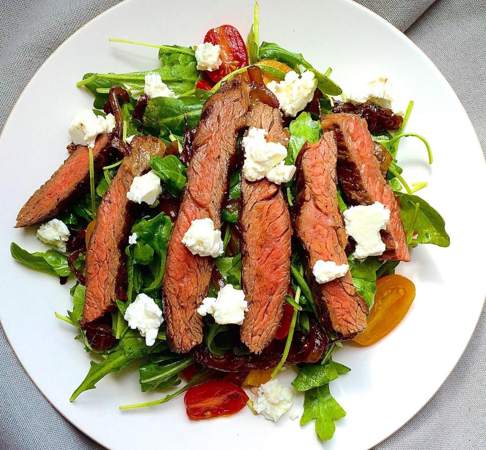 Grilled Skirt Steak Salad with Arugula, Balsamic-Glazed Onions, Tomatoes, and Feta