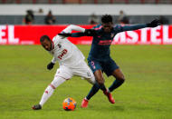 Soccer Football - Europa League Round of 16 Second Leg - Lokomotiv Moscow vs Atletico Madrid - RZD Arena, Moscow, Russia - March 15, 2018 Lokomotiv Moscow's Manuel Fernandes in action with Atletico Madrid's Thomas Partey REUTERS/Sergei Karpukhin