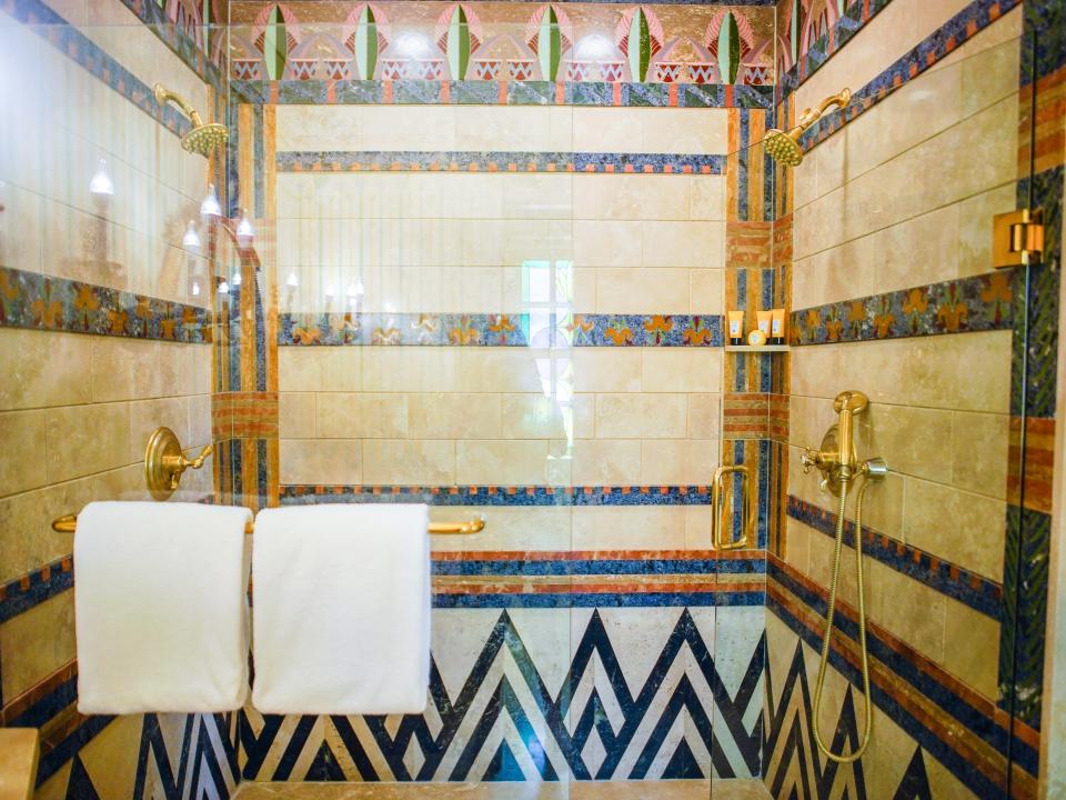 A view of the shower from the outside  in the Aurora Suite in the former Versace Mansion