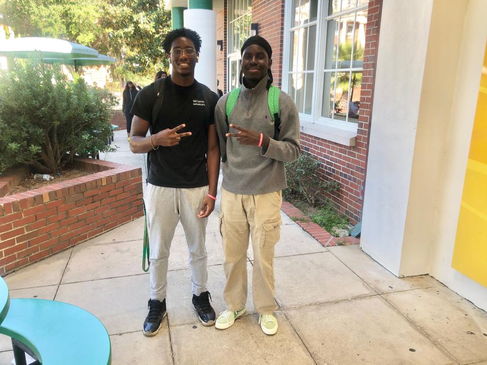 Florida A&M University freshmen Aaron Jones (left) and Sebastien Lacroix (right), both psychology majors, pose for a photo at The Quad on campus Monday, October 10, 2022.