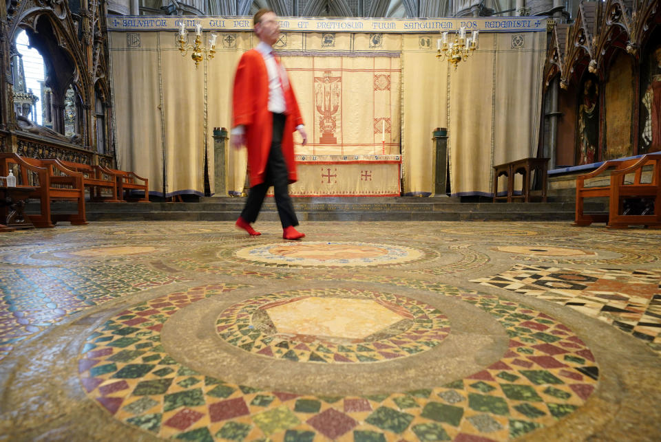 Abbey Marshal Howard Berry walks across the centre of the Cosmati pavement, located before the altar, during a photo call at Westminster Abbey, central London, to announce special events to celebrate the Coronation of King Charles III. Picture date: Thursday March 23, 2023. (Photo by Jonathan Brady/PA Images via Getty Images)