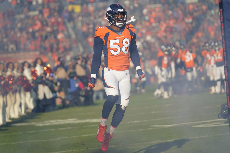 FILE - In this Dec. 29, 2019 file photo, Denver Broncos outside linebacker Von Miller reacts before an NFL football game against the Oakland Raiders in Denver. Miller's read on the Super Bowl is this: Patrick Mahomes and the Kansas City Chiefs will be a handful. The Broncos Pro Bowl pass rusher knows that from first-hand experience. But he's predicting a San Francisco 49ers win.(AP Photo/Jack Dempsey)