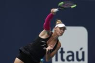 Mar 24, 2019; Miami Gardens, FL, USA; Polona Hercog of Slovenia serves against Simona Halep of Romania (not pictured) in the third round of the Miami Open at Miami Open Tennis Complex. Mandatory Credit: Geoff Burke-USA TODAY Sports