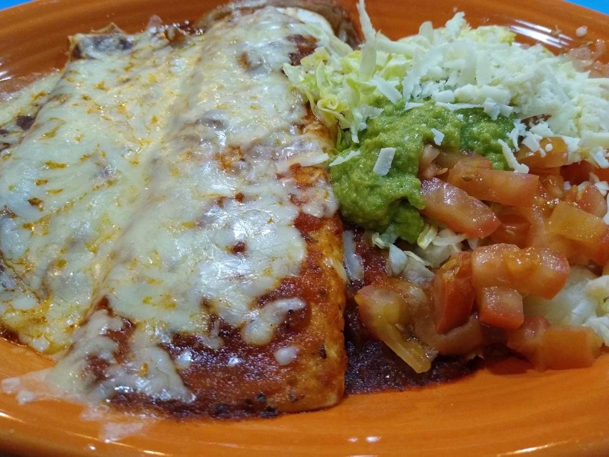 Mucho Bueno’s No. 19 vegetarian combo features a bean burrito, cheese enchilada and bean tostada.
