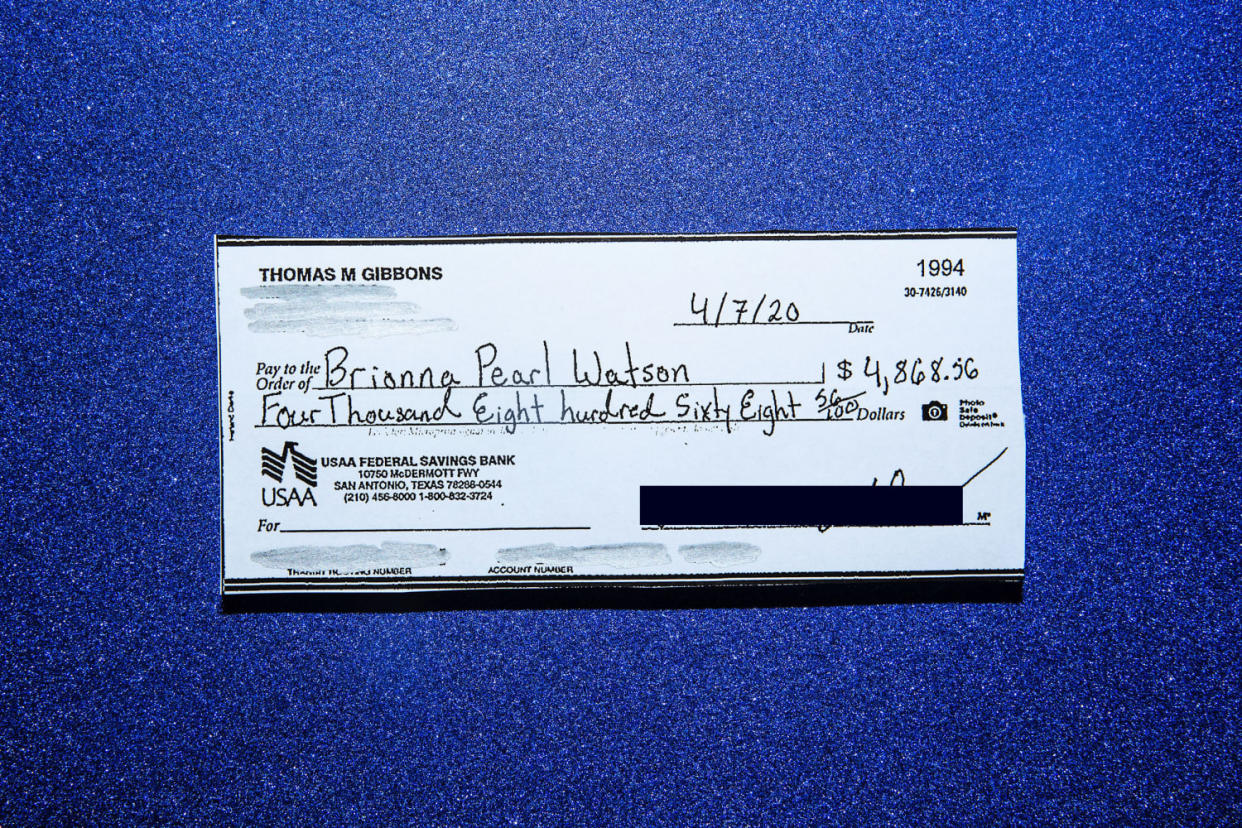 Image: Tom Gibbons dropped an envelope with a $272 check inside to pay his water bill. He pulled up his mobile bank account in the days after and saw a transaction that alarmed him: a check worth nearly $5,000. (Calla Kessler / for NBC News)