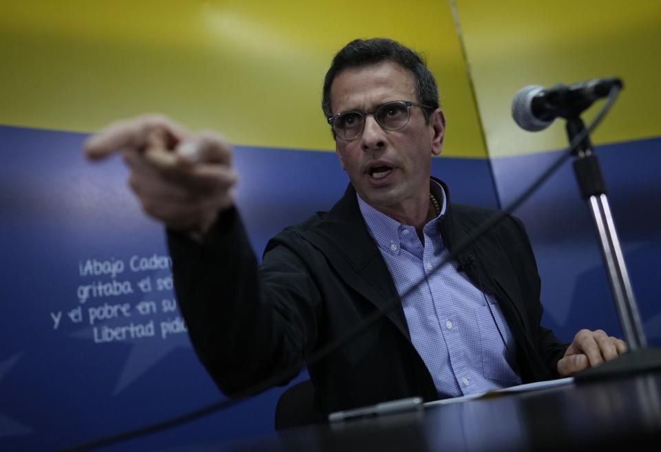 Venezuela opposition member and former presidential candidate Henrique Capriles, speaks to the press in Caracas, Venezuela, Wednesday Aug 11, 2021. Capriles confirmed the participation of his political party "Primero Justicia" in the negotiations that will take place in Mexico. (AP Photo/Ariana Cubillos)