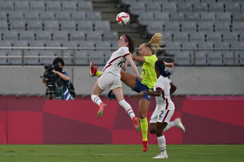 United States goalkeeper Adrianna Franch (18) and Sweden forward Stina Blackstenius (11) jump for a head shot during the Tokyo Summer Olympic Games in Tokyo in 2021. File Photo by Richard Ellis/UPI