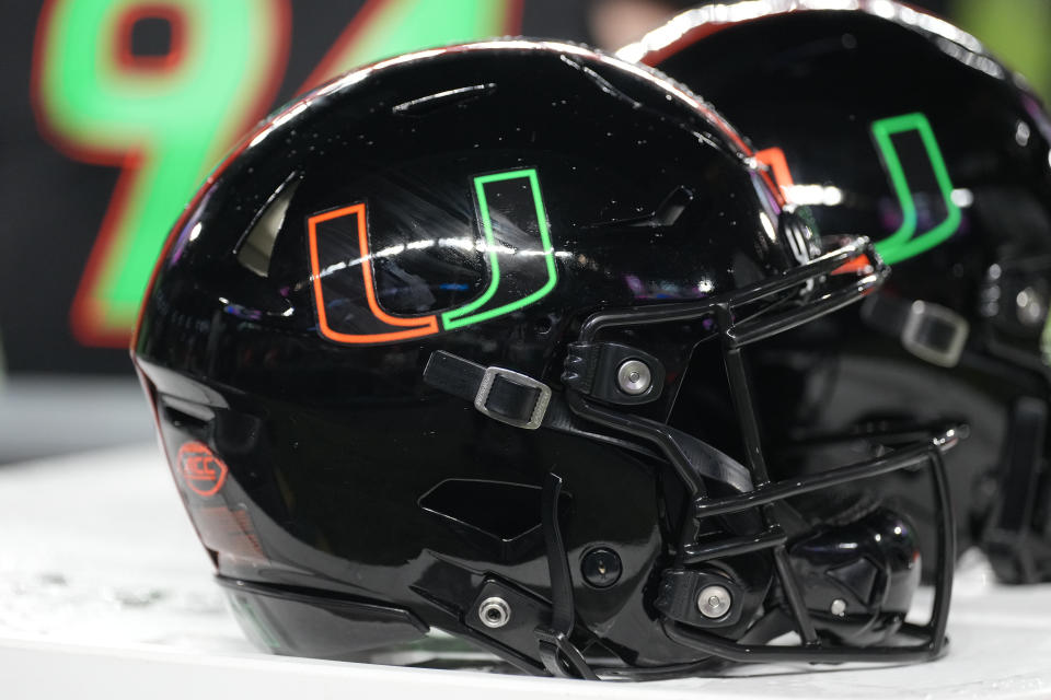 MIAMI GARDENS, FL - OCTOBER 07: a new Miami Hurricanes helmet rests near the sidelines during the game between the Georgia Tech Yellow Jackets and the Miami Hurricanes on Saturday, October 7, 2023 at Hard Rock Stadium, Miami Gardens, Fla. (Photo by Peter Joneleit/Icon Sportswire via Getty Images)