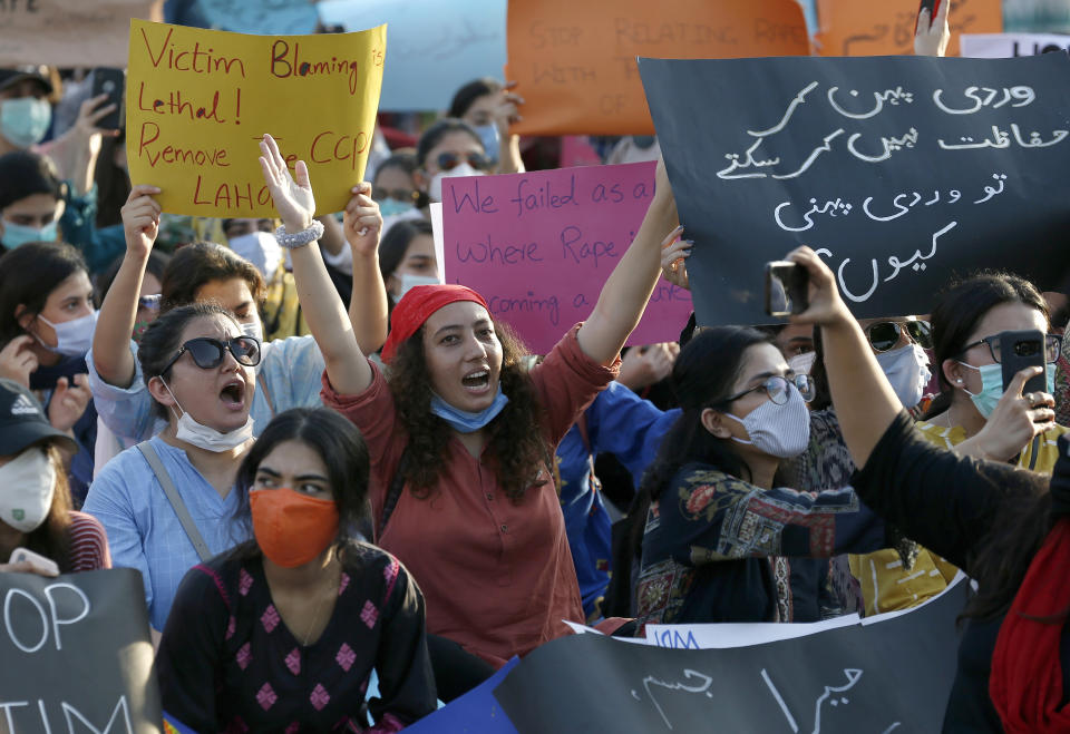 Members of Women Democratic Front chant slogans during a rally to condemn the incident of rape on a deserted highway, in Islamabad, Pakistan, Saturday, Sept. 12, 2020. Pakistani police said they detained 15 people for questioning after two armed men allegedly gang raped a woman in front of her children after her car broke down on a deserted highway near the eastern city of Lahore. (AP Photo/Anjum Naveed)