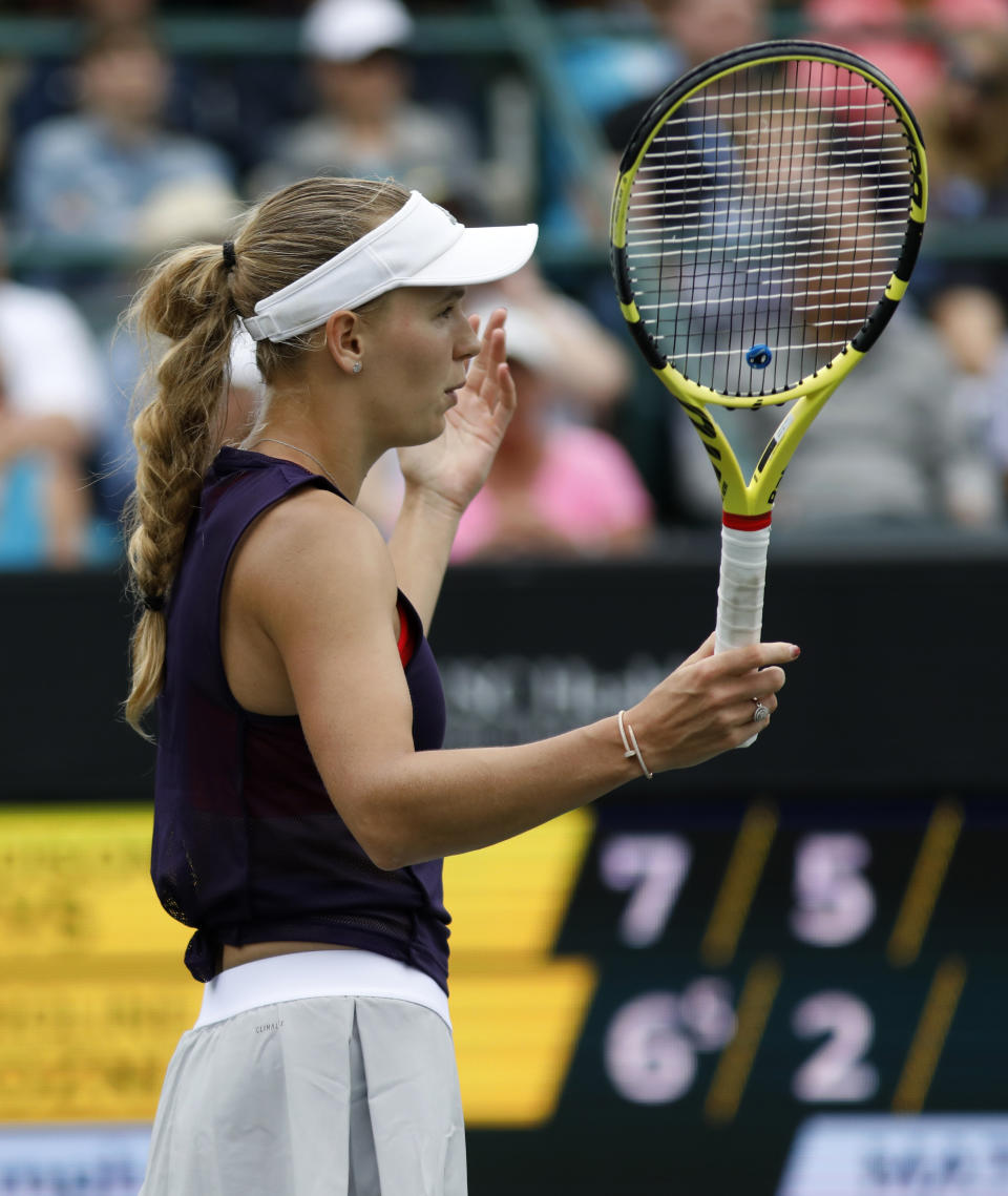 Caroline Wozniacki, from Denmark, reacts to a shot against Madison Keys, of the United States, during the final at the Volvo Car Open tennis tournament in Charleston, S.C., Sunday, April 7, 2019. Keys won 7-6(5), 6-3. (AP Photo/Mic Smith)