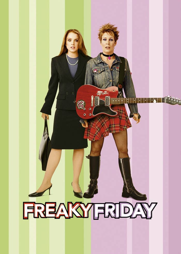 Lindsay Lohan is standing in a black suit with a briefcase next to Jamie Lee Curtis in a punk outfit with a checked skirt, denim jacket and a red guitar in her hand. Text: Freaky Friday