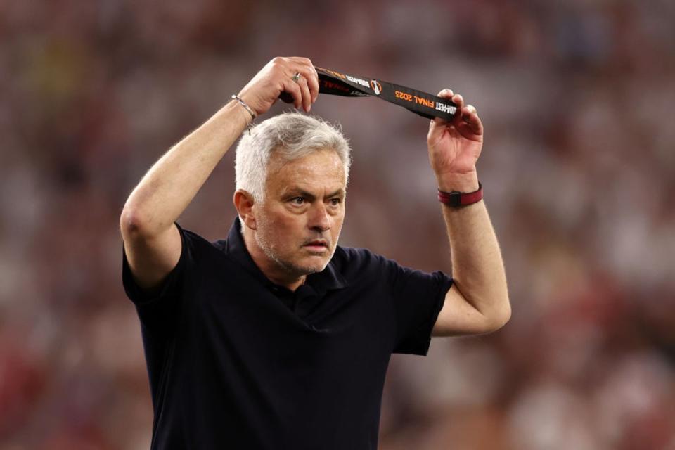 Mourinho removes his runners-up medal after Roma lost on penalties (Getty Images)