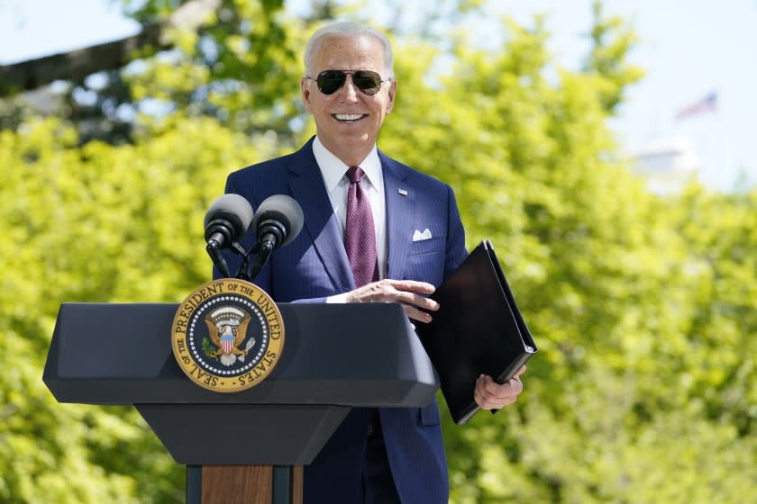 President Joe Biden responds to a question from reporters about COVID-19, on the North Lawn of the White House, Tuesday, April 27, 2021, in Washington. (AP Photo/Evan Vucci)