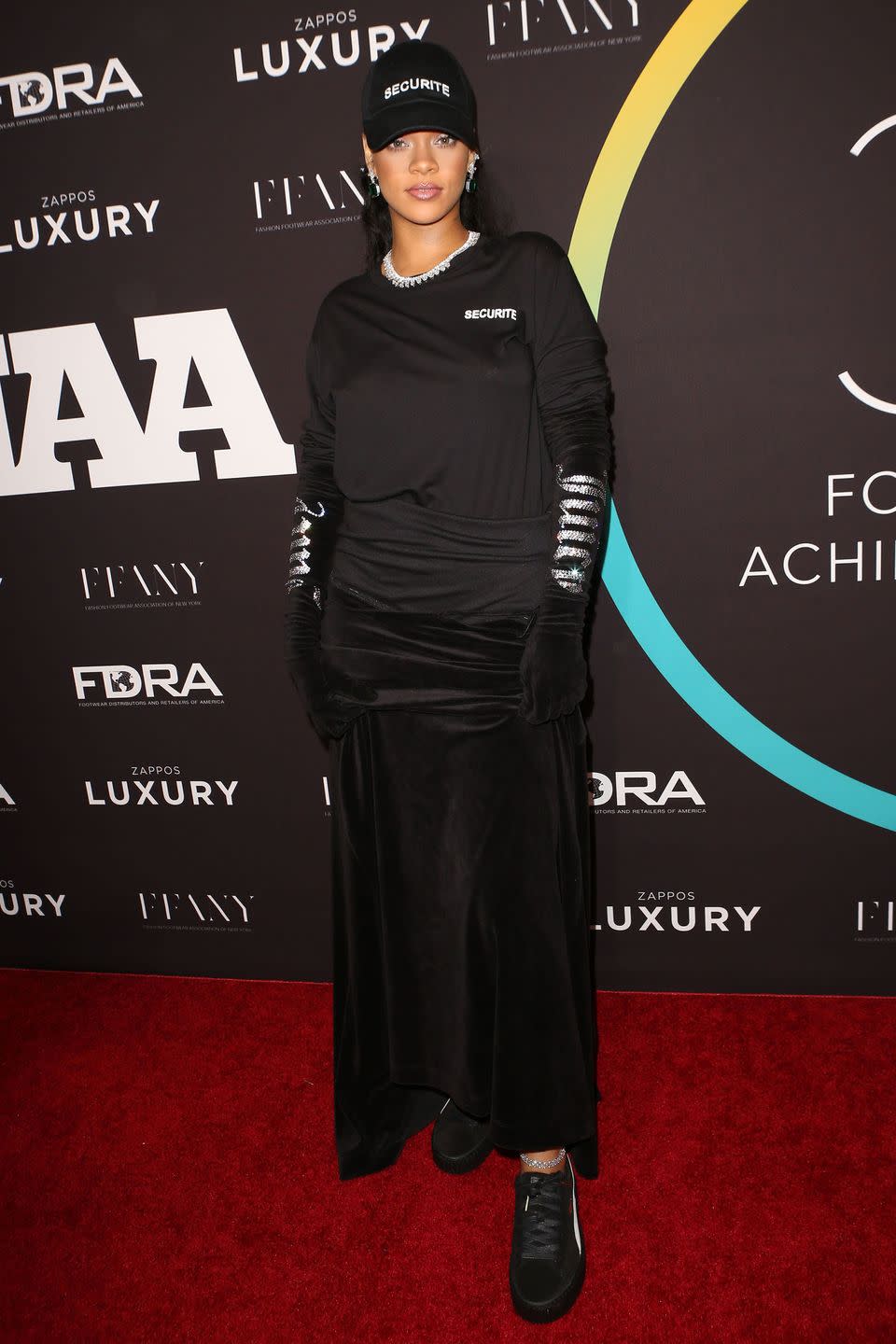 <p>In Fenty x Puma creepers, a Securite basebal cap and long sleeve tee, velvet skirt, velvet gloves and Chopard jewels at the 30th annual FN Achievement Awards in NYC.</p>