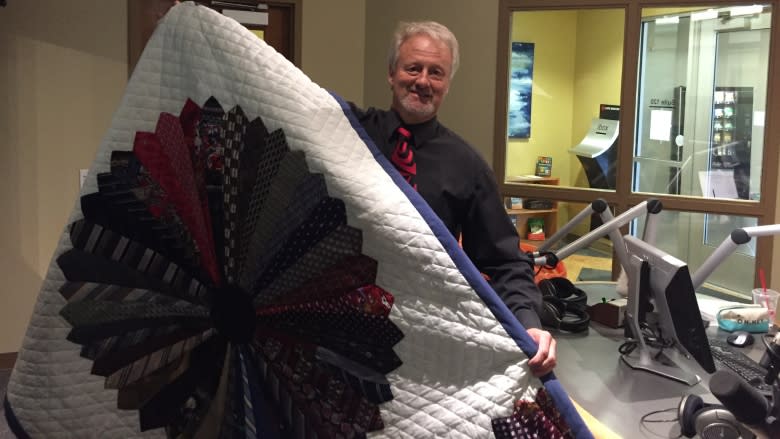 Formal wear gets cozy as retired ties transformed into quilt