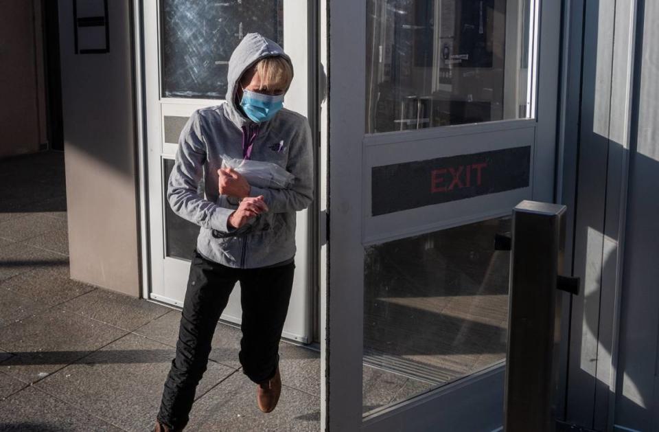 Sherri Papini runs out of the Sacramento County Main Jail after being released on Tuesday, March 8, 2022. Papini, the Redding woman whose alleged kidnapping in 2016 sparked a nationwide search, spent five nights in the jail after being arrested for wire fraud and lying to federal agents about the abduction.