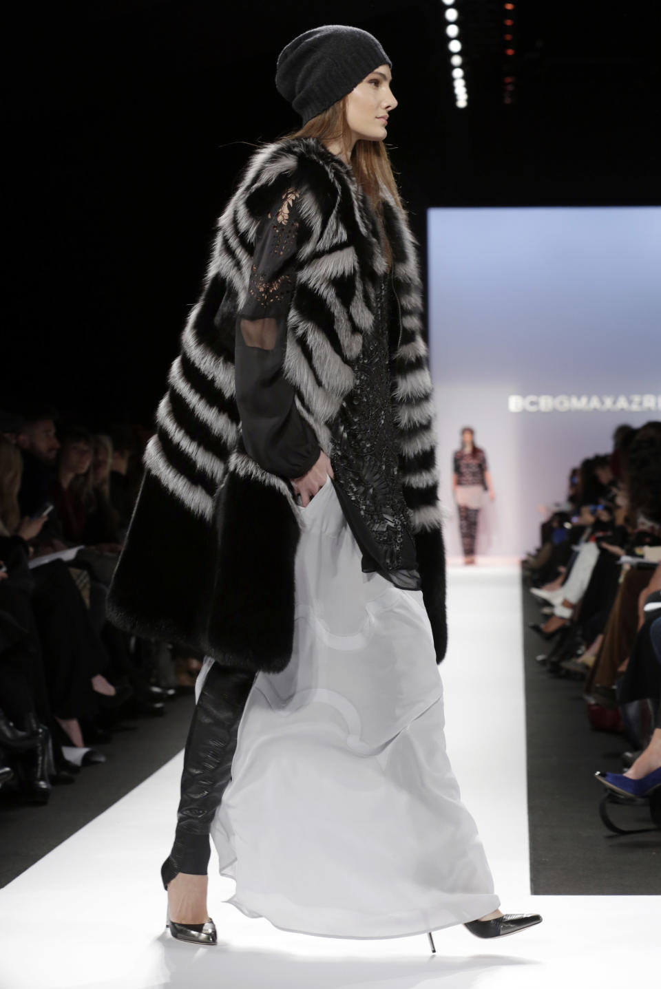 The BCBG Max Azria Fall 2013 collection is modeled during Fashion Week in New York on Thursday, Feb. 7, 2013. (AP Photo/Richard Drew)