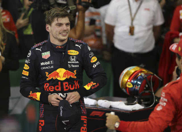 Verstappen wins 1st F1 title with last lap pass of Hamilton