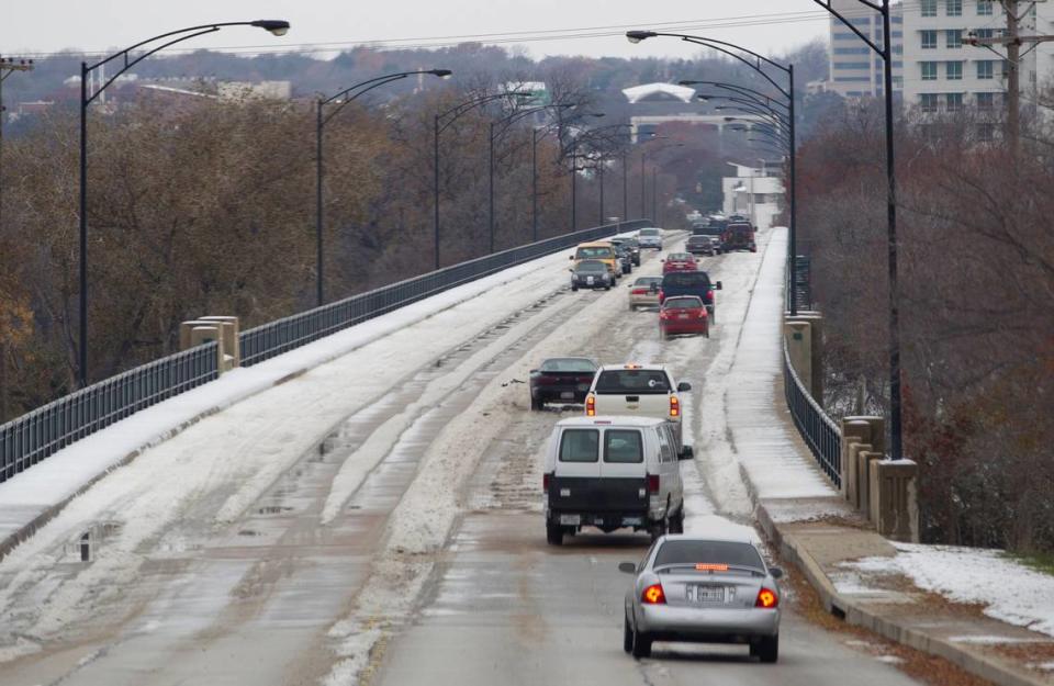 Cobblestone ice on the Lancaster Bridge and other overpasses slowed traffic on Fort Worth streets on Monday, Dec 9, 2013.