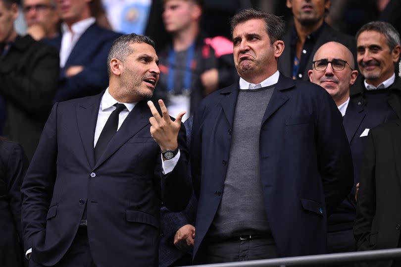 Manchester City Emirati chairman Khaldoon al-Mubarak (L) speaks with Manchester City's Spanish CEO Ferran Soriano (R) during the English Premier League football match between Manchester City and Nottingham Forest at the Etihad Stadium in Manchester, north west England, on September 23, 2023.