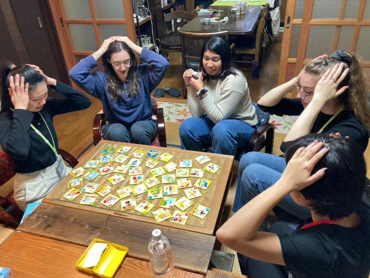 Playing iroha-karuta (a simple card game often used in teaching the hiragana syllabary of Japanese) during their homestay in Japan are Lavender Wong, left, Chloe McLeod, Vandhana Kammampati, Natalie Thimot and Autumn Cleymans.