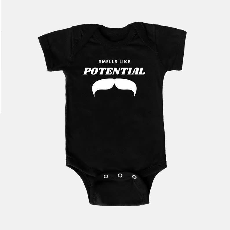 18) Smells Like Potential Baby Onesie