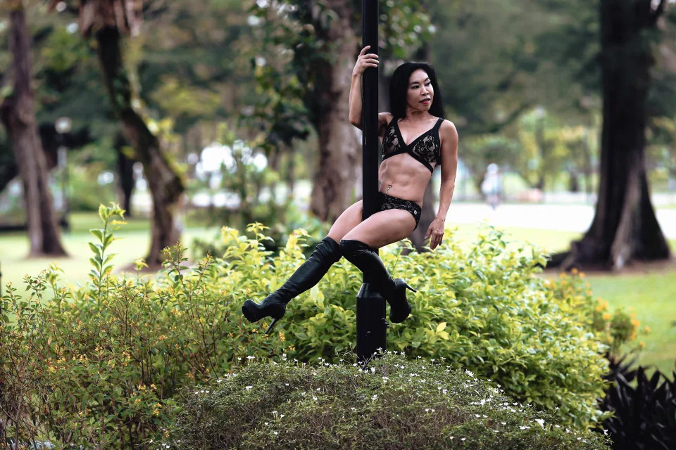 Ming Leong's pole dance fitness team was featured in the 2009 National Day Parade.