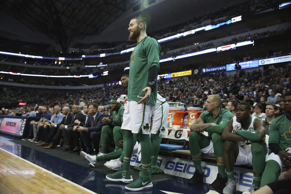 Boston Celtics center Aron Baynes reportedly suffered a broken left hand in their loss to the Phoenix Suns on Wednesday night, and is expected to miss at least a month. (AP Photo/Andy Jacobsohn)