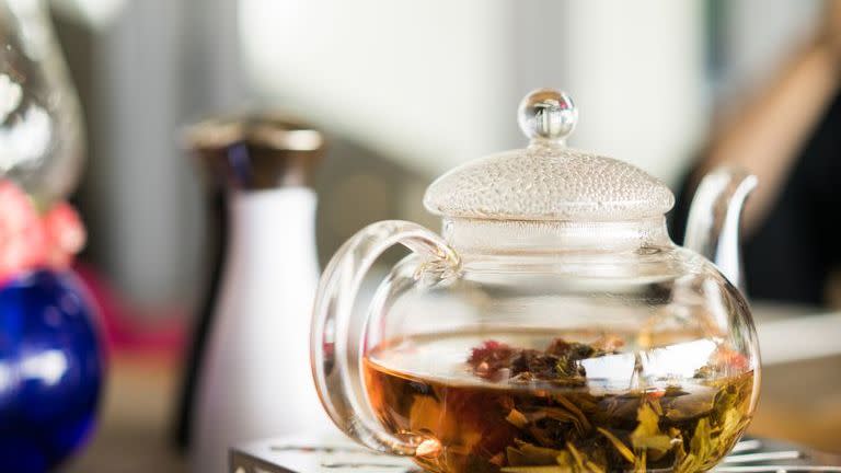 herbal tea in kettle on table