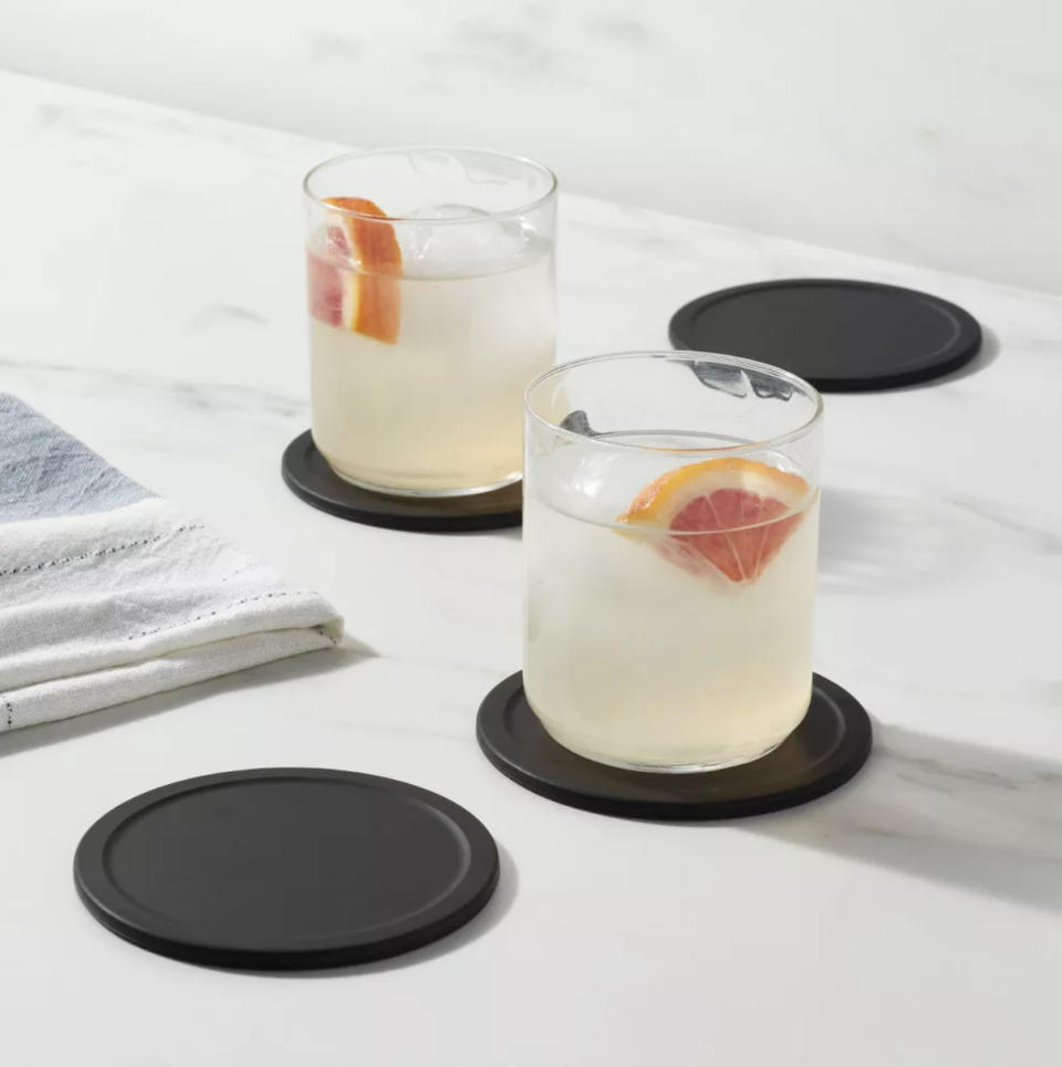 A set of black silicone coasters