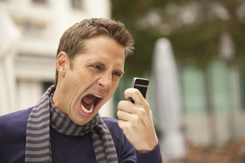 A man yelling at his phone