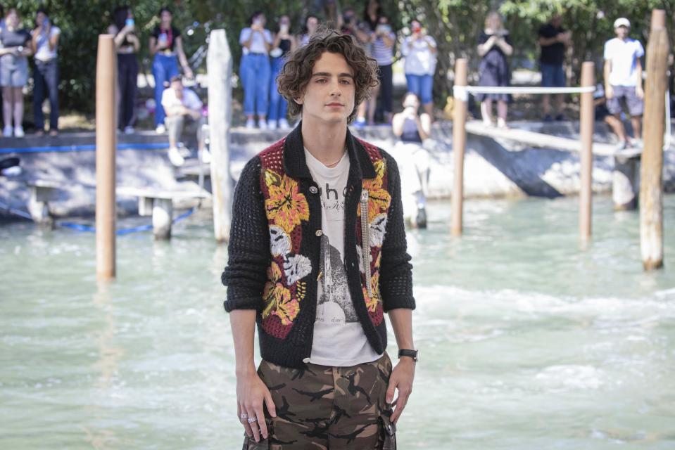 Timothee Chalamet poses for photographers upon arrival for the photo call of the film 'Bones and All' during the 79th edition of the Venice Film Festival in Venice, Italy, Friday, Sept. 2, 2022. (Photo by Vianney Le Caer/Invision/AP)