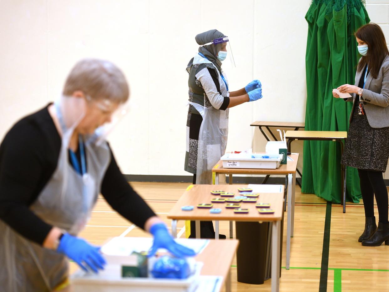 Schools in England are preparing to welcome all students back from 8 March (AFP via Getty Images)