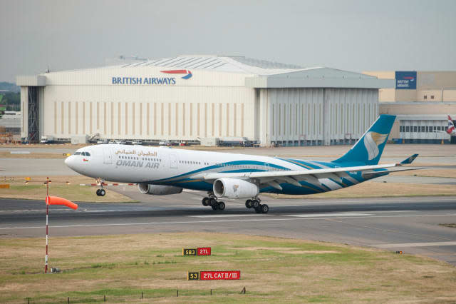 London UK London Heathrow Airport (LHR) Oman Air Airbus A 330 coming into land.
