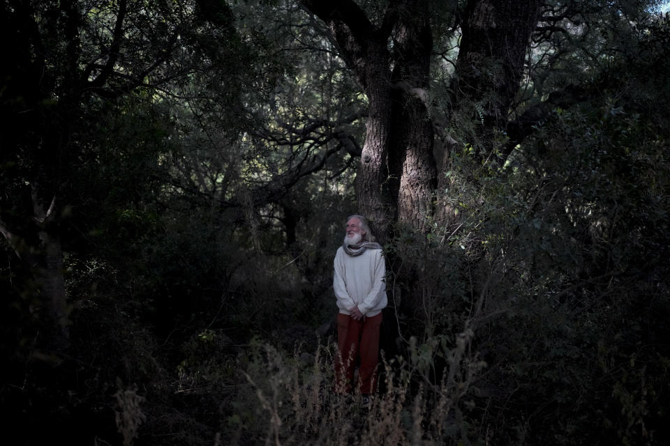 Daniel Brower poses for a picture in his backyard in Capilla del Monte, Cordoba, Argentina, Tuesday, July 18, 2023. Brower renounced his Christian upbringing and now looks for his spirituality through music and nature. In the pope’s homeland of Argentina, Catholics have been renouncing the faith and joining the growing ranks of the religiously unaffiliated. Commonly known as the “nones,” they describe themselves as atheists, agnostics, spiritual but not religious, or simply: “nothing in particular.” (AP Photo/Natacha Pisarenko)